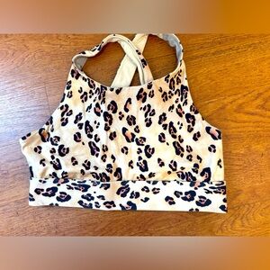 FABLETICS animal print cross back racer back style size medium sports bra.